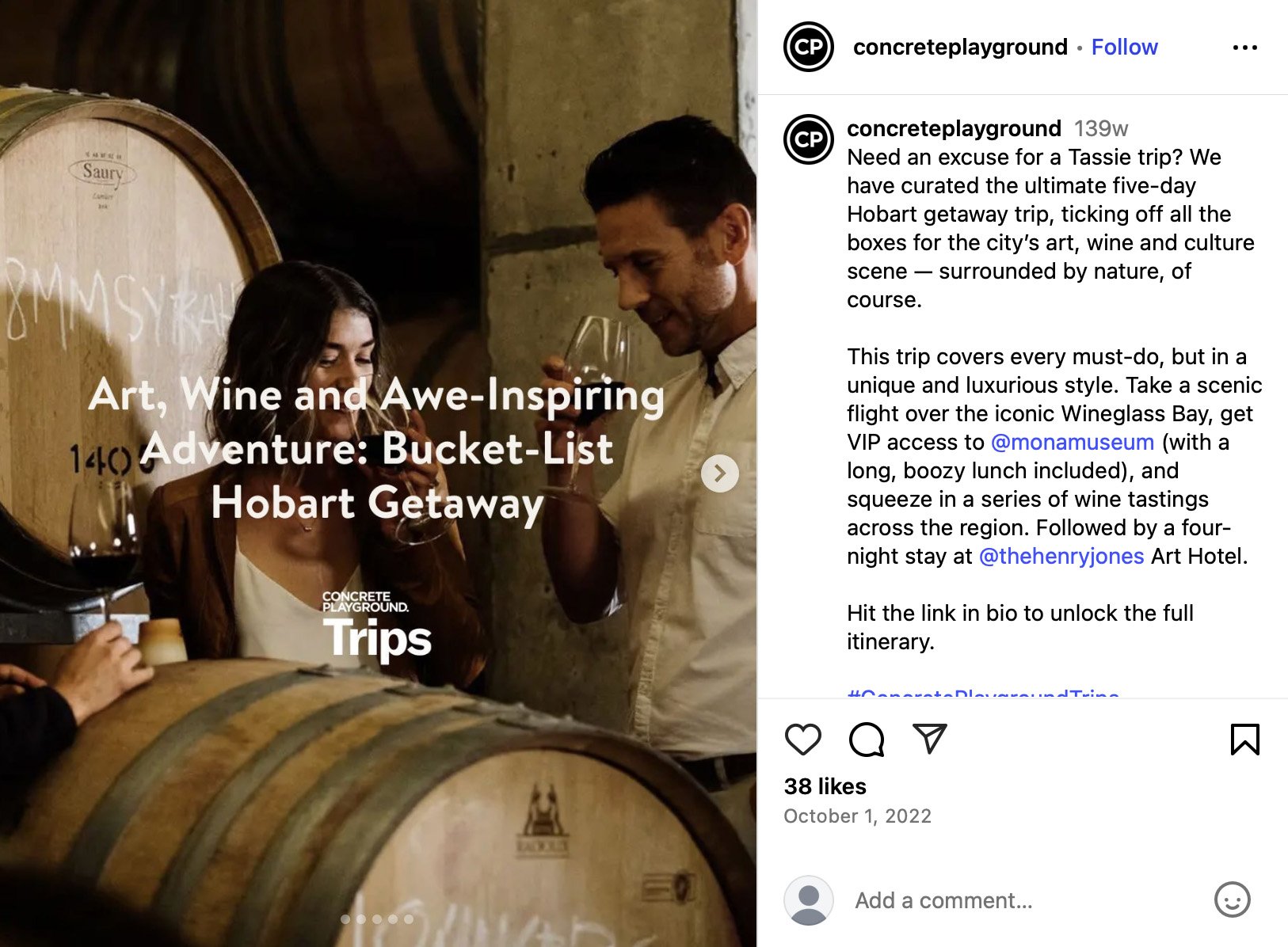 Couple sipping wine from barrels in rustic cellar, Concrete Playground trip giveaway