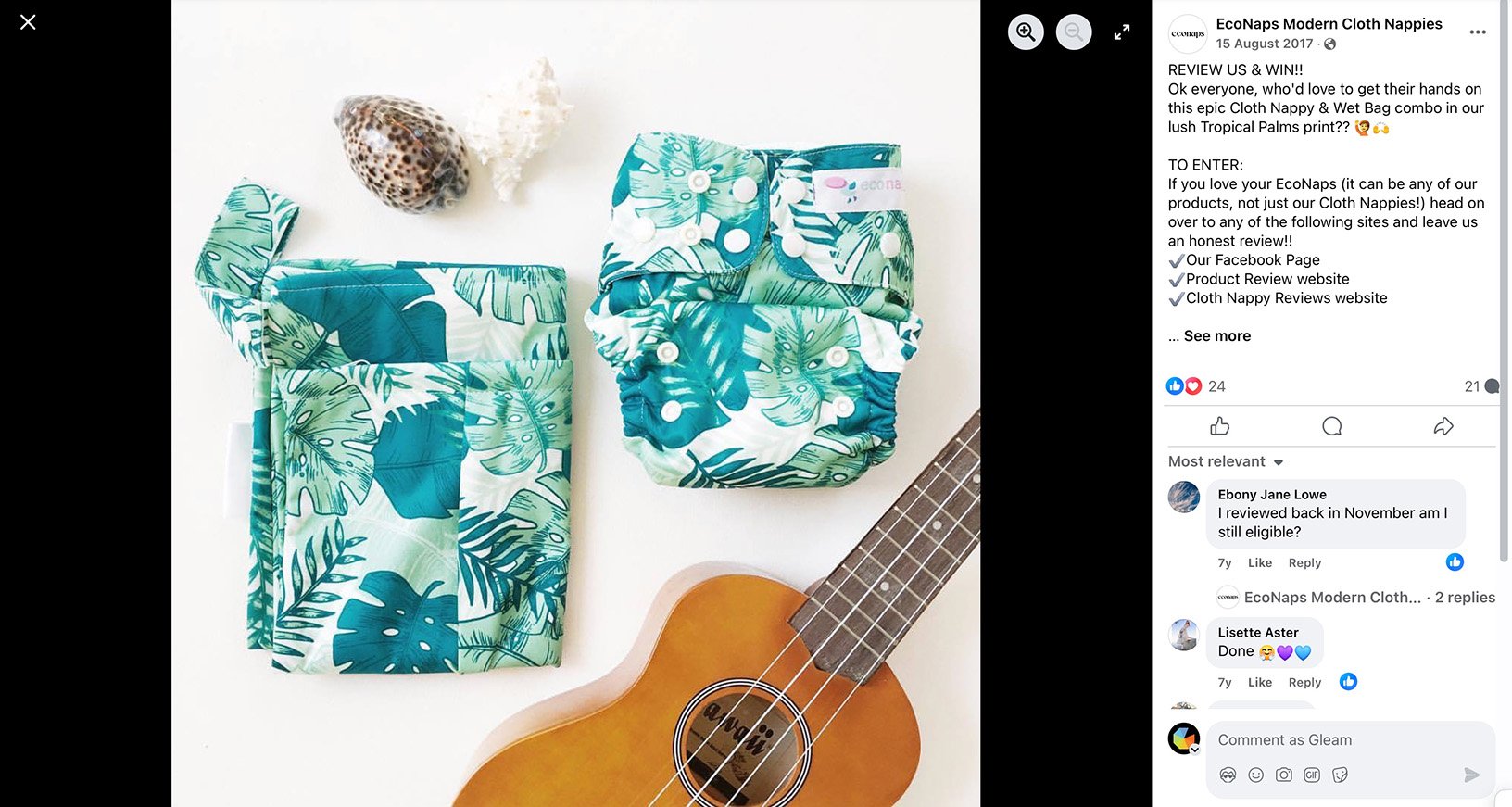 EcoNaps Tropical Palms cloth nappy and wet bag beside a wooden ukulele
