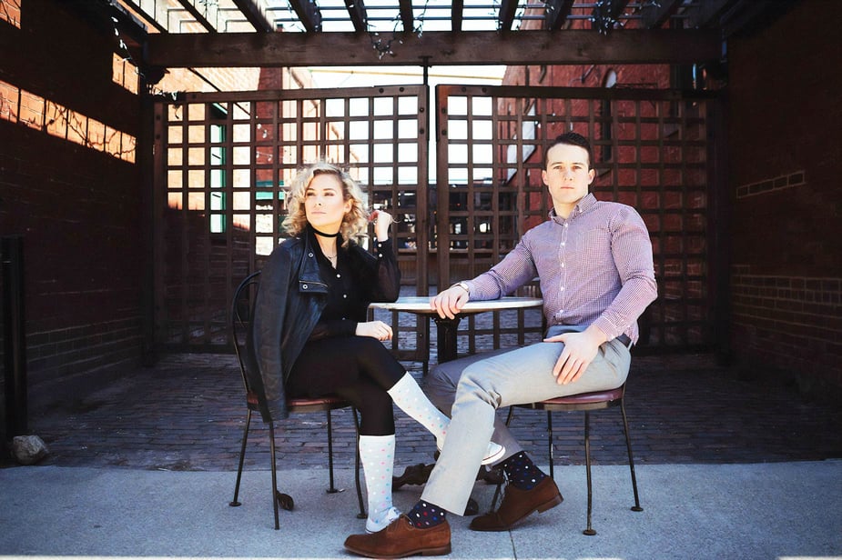 Two models wearing Flyte Sock's products