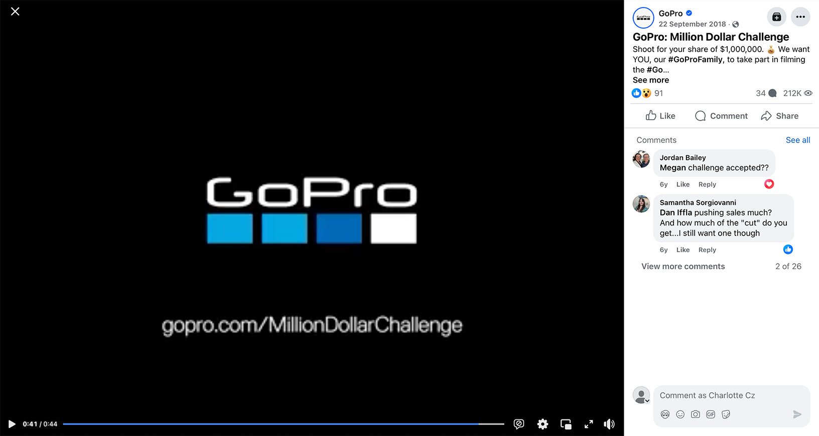 A stunning sunrise over the ocean captured from the air, with gentle waves rolling towards the beach and a coastal town silhouetted on the left