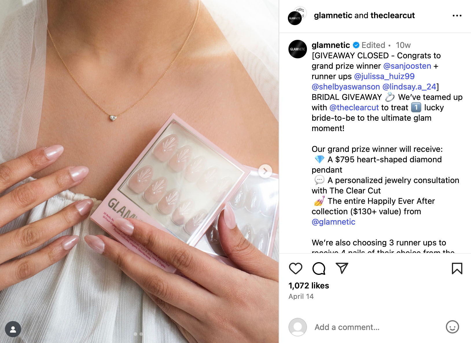 Close-up of a person wearing a heart-shaped necklace and holding a set of Glamnetic bridal press-on nails