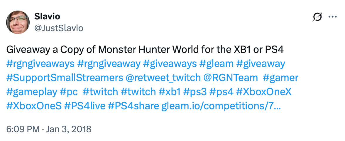 Tweet announcing a giveaway for Monster Hunter World on Xbox One or PS4 with several gaming hashtags